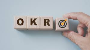 Scrabble letters that read “OKR.”