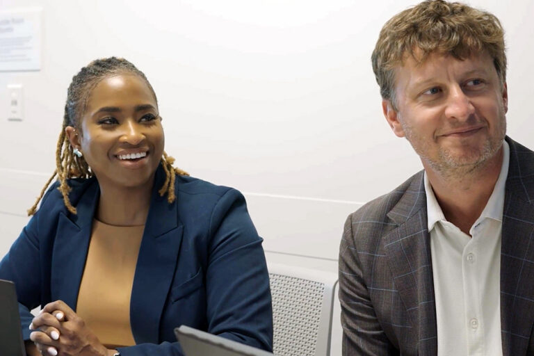 Two executives in a culture workshop meeting.